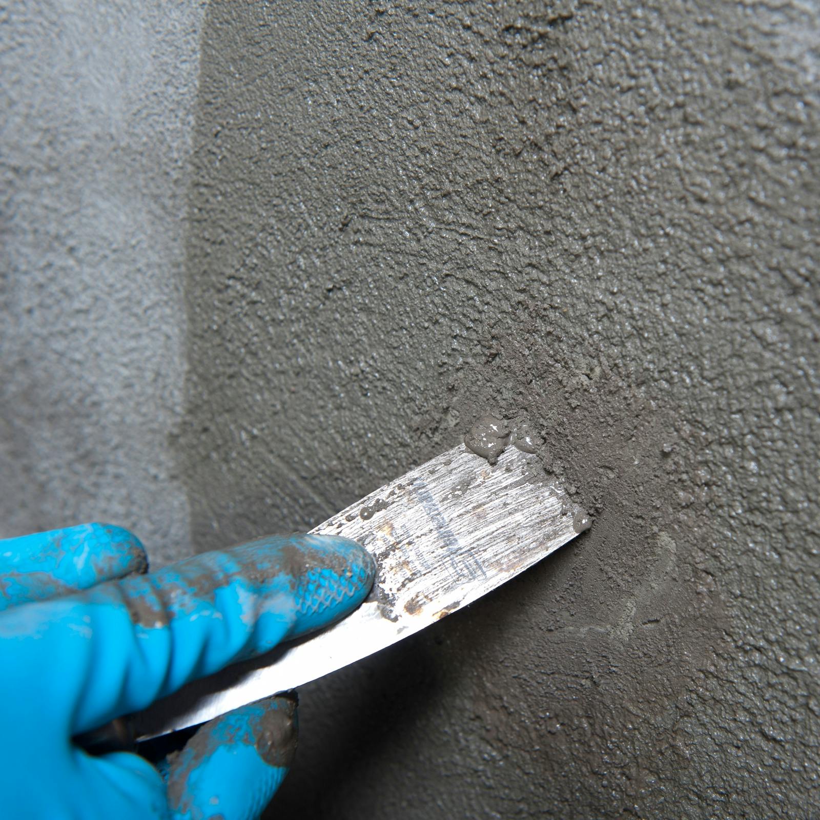 Remove excess material with trowel