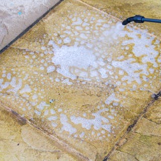 Apply Roxil Wood & Patio Cleaner to the area to be cleaned